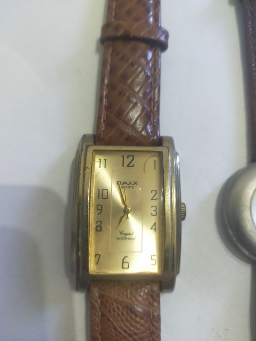 "Часы" - *OMAX*.