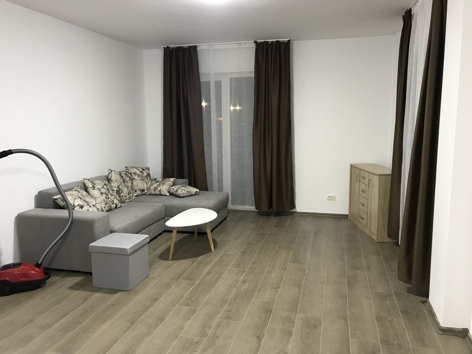 Inchiriez apartament + loc de parcare