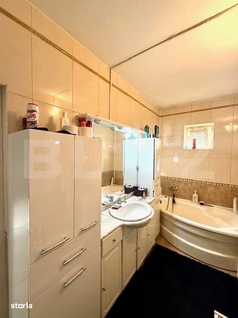 Casa cu 5 camere si un teren de 700 mp