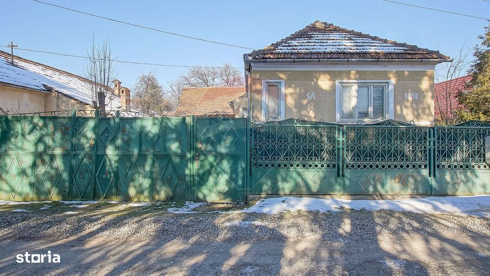 Teren de Vis în Tărlungeni cu Căsuță din Lemn – Liniștea Te Așteaptă