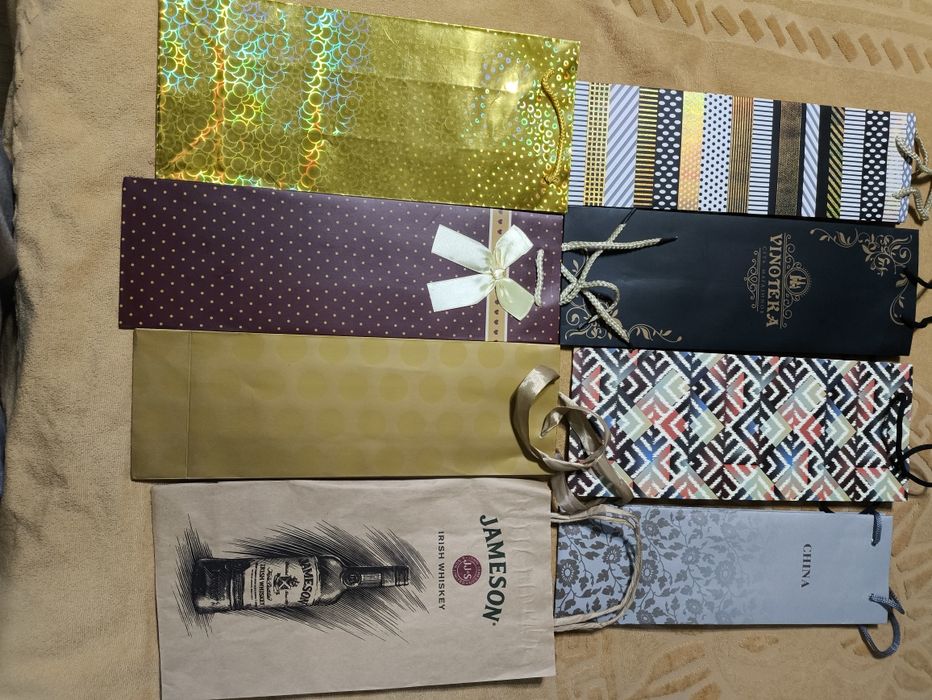 Подарочные  и брендовые бумажные пакеты