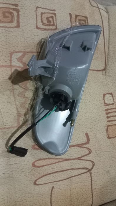 Поворотник левый на мазду