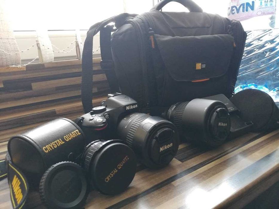 Продавам фотоапарат NIKON D5100 с пълен комплект обективи и аксесоари