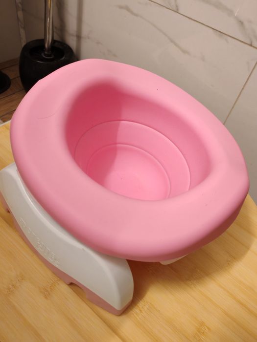 Set oliță de călătorie/reductor WC Potette Plus 2in1 Kalencom cu absorbant de silicon roz + 8 bc.de pungi