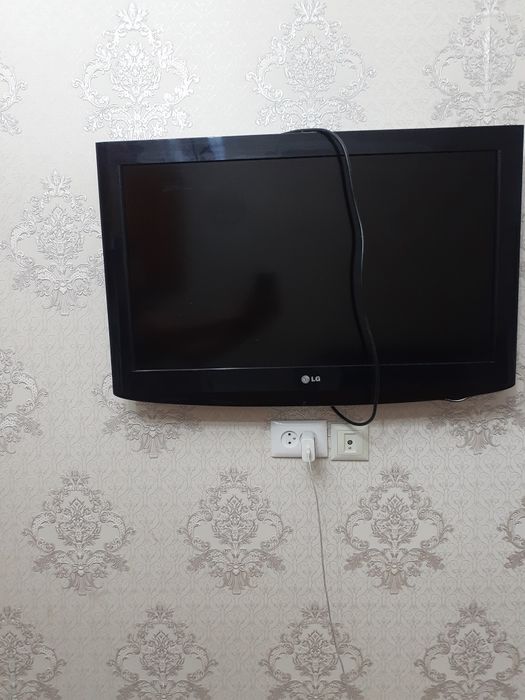 Телевизор LG..и шкаф