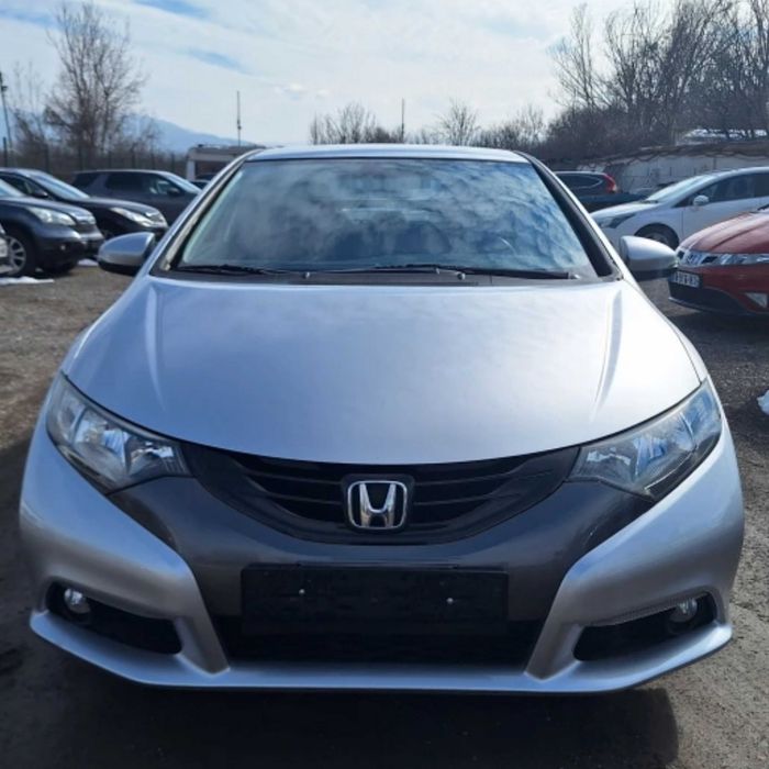 Мазда 2-греди-багажник -thule хонда сивик