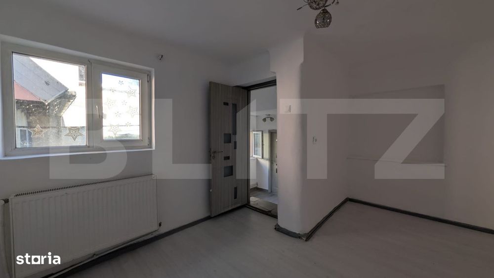 Casa cu 2 camere si mansarda ,plus bucatarie de vara .