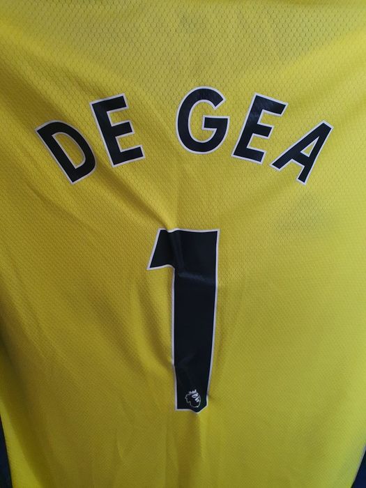 Блуза с дълъг ръкав на Manchester United.