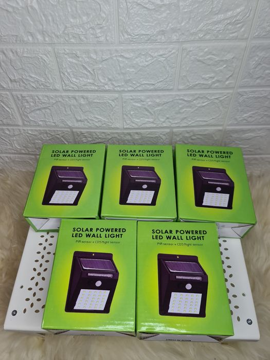 100lei Livrare GRATUITA set 4 lămpi solare perete/gard