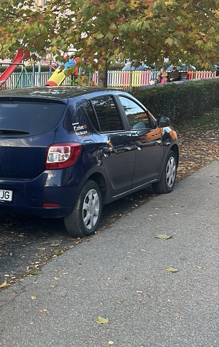 Vand dacia sandero ..