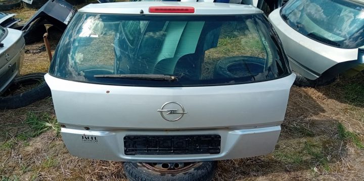 Haion  Mici zgarieturi cu luneta Opel Astra H seria