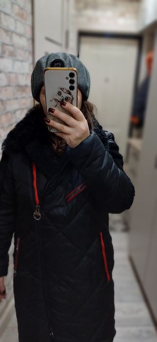 Продам женский пуховик