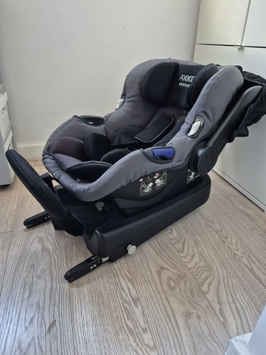 Scaun de mașină pentru bebeluși Axkid Modukid cu baza  ISOFIX