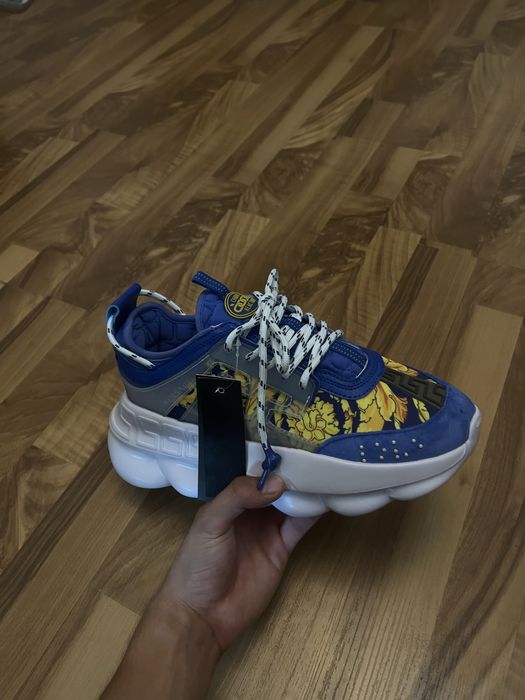 Versace chain reaction baron