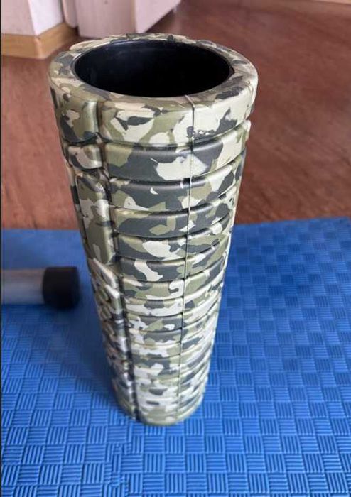 Exercise Machine with weights, mats, and roller