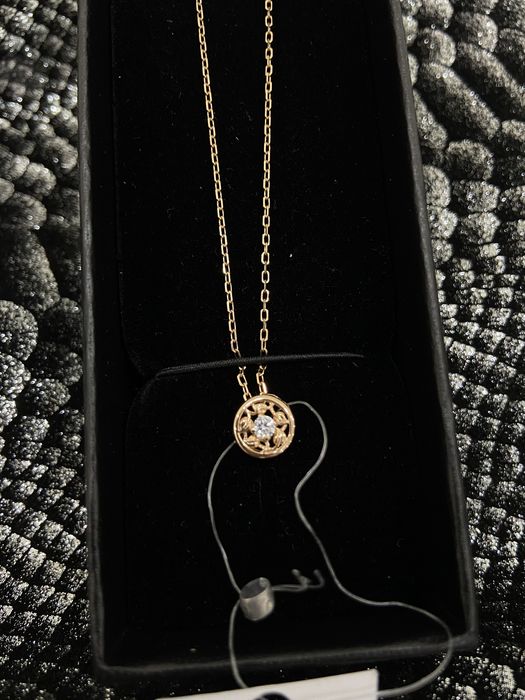 Золотая цепочка с кулоном