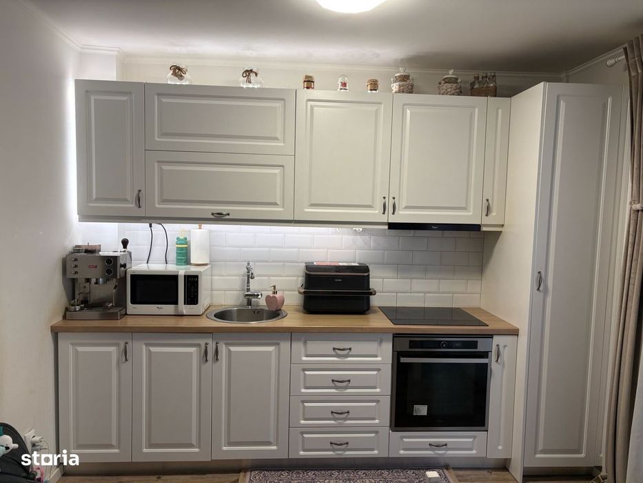 Apartament cu 3 camere,etaj 1,garaj de 30 mp