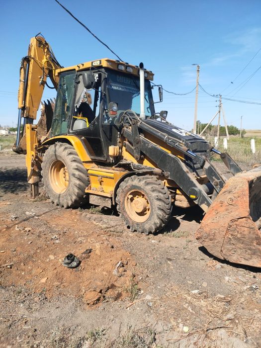 Продаю экскаватор-погрузчик CAT432D