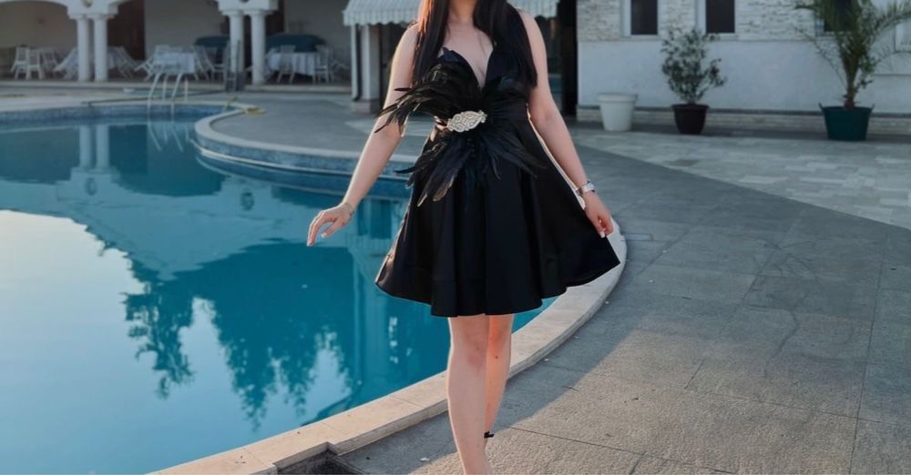 Rochie de seară cu pene