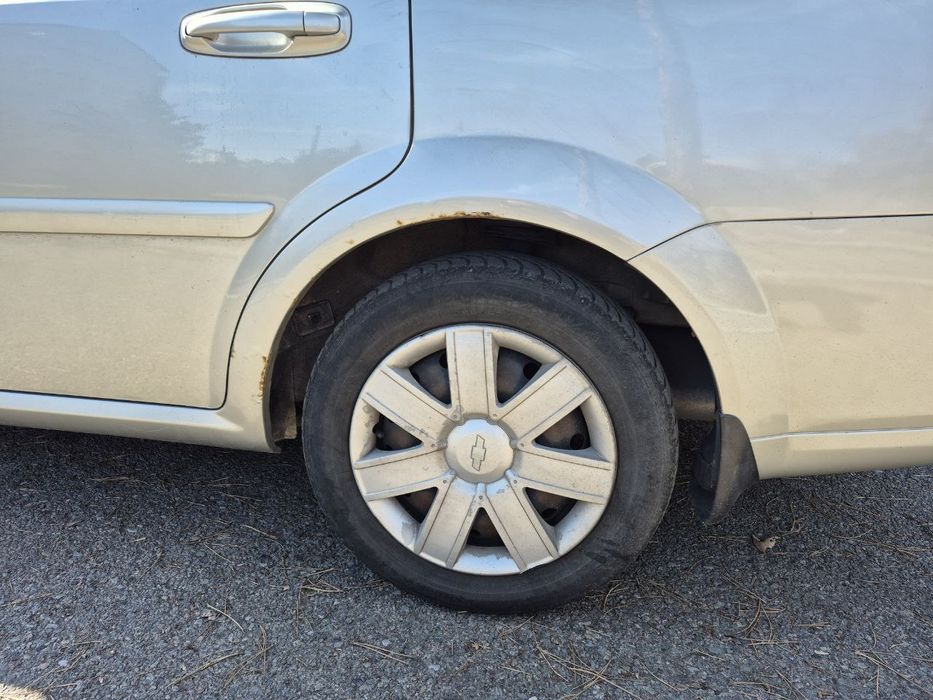 Lacetti 2009 года