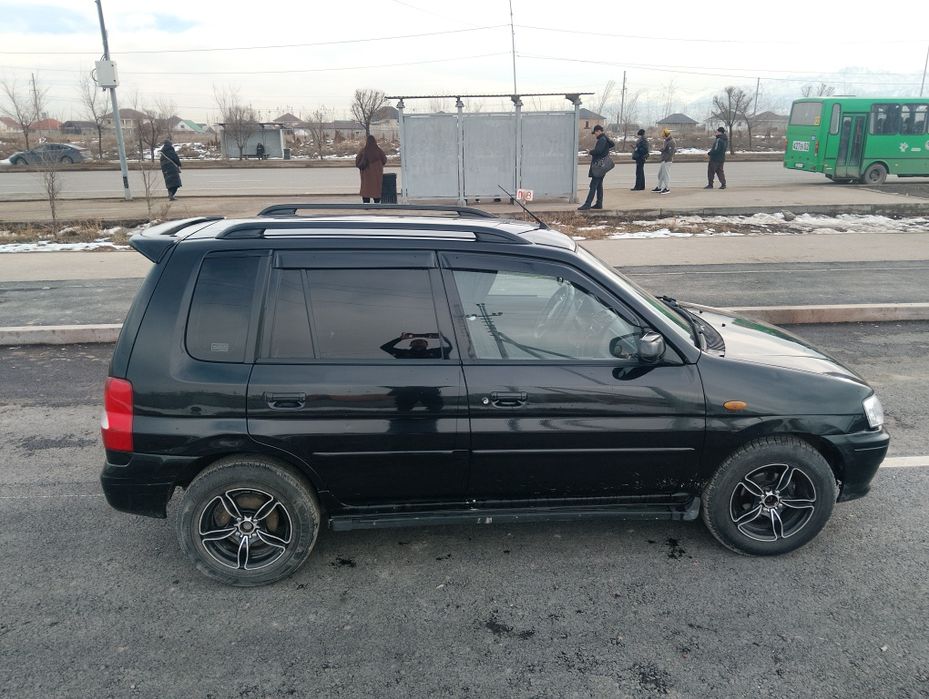Mazda Demio 2003 г
