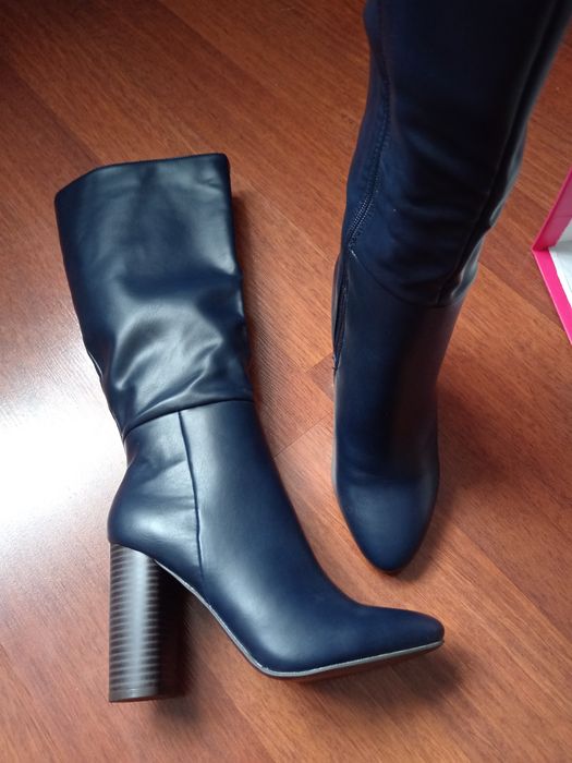 Новые осень-весна сапоги.
