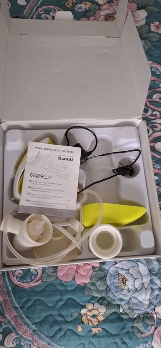 Электрический молокоотсос