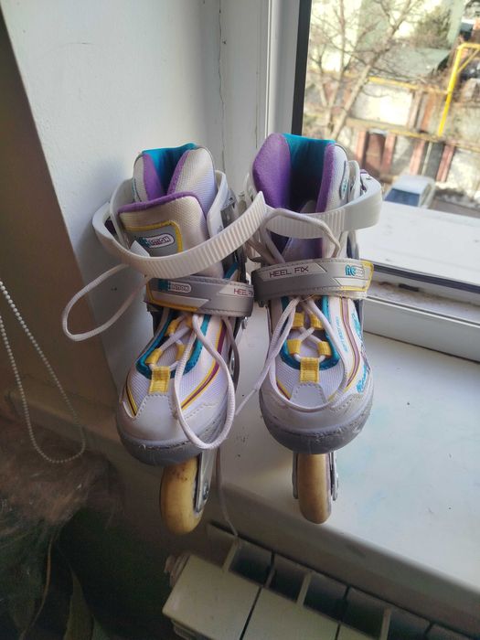 Продам роликовые коньки б/у