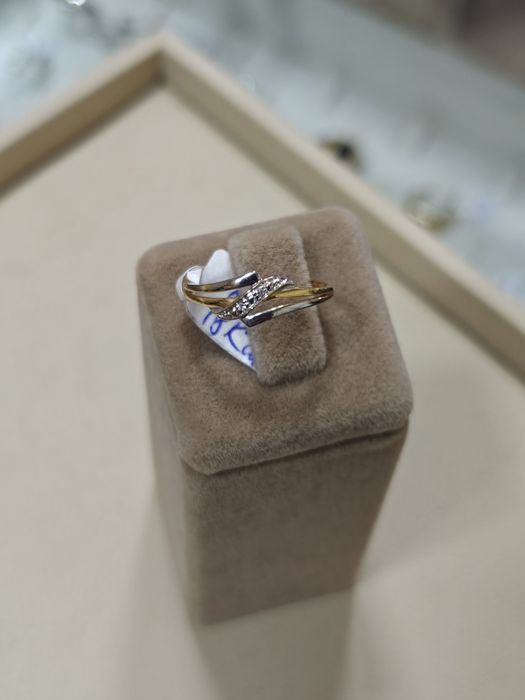 Inel aur 18k 1.26gr cu 2 diamante (r)