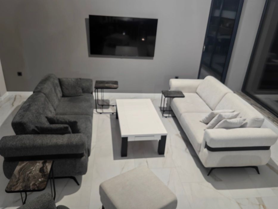 Два дивана троика, кресло и табуретка.