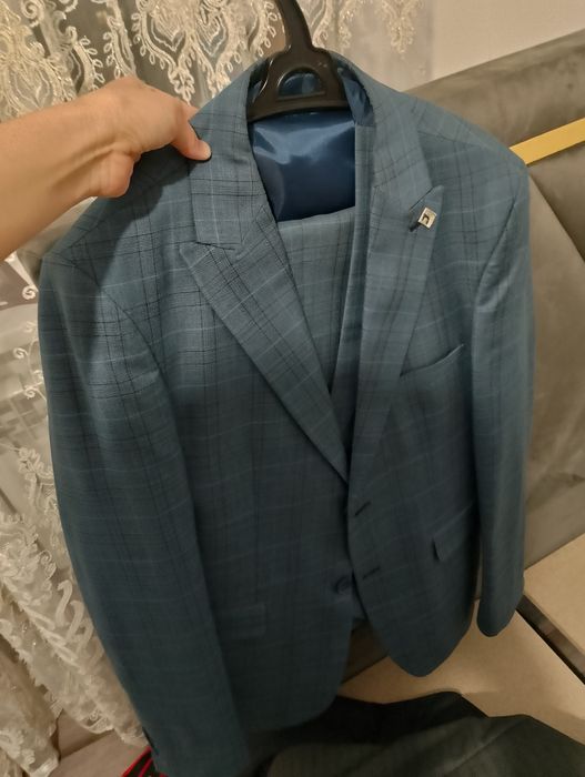 Костюм троика, пиджак, желет, брюки.