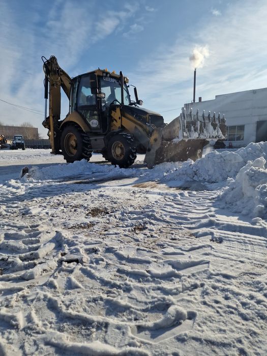 Экскаватор Погрузчик CAT428E