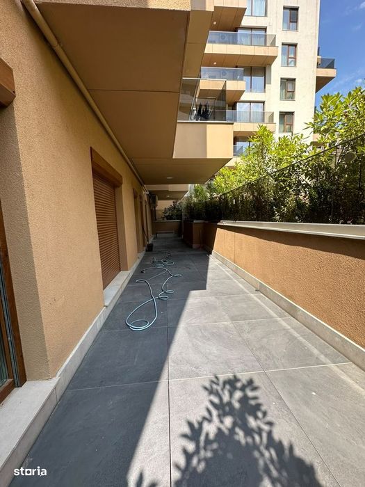 Apartament in Pipera la parter cu 4 camere, curte privată de 30 mp și — fotografia 1
