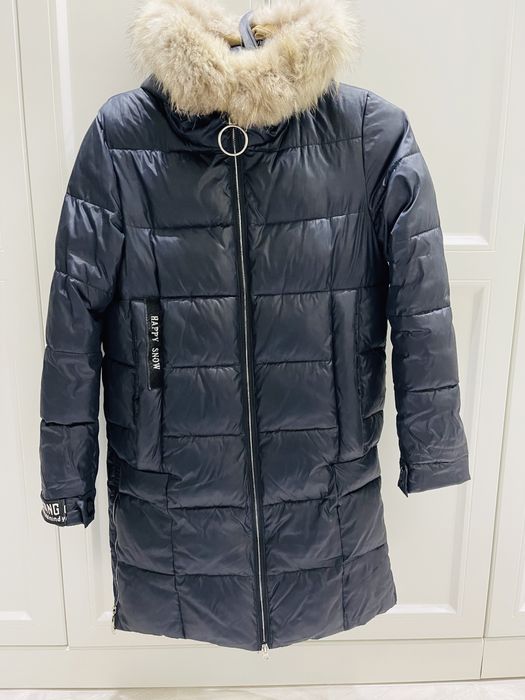 продам темлую куртку