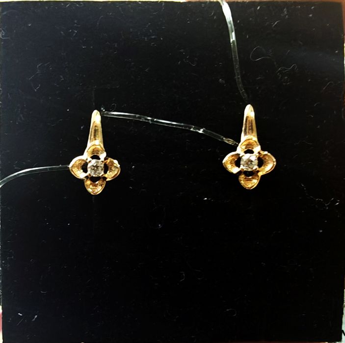 Продам серьги серебро и золото