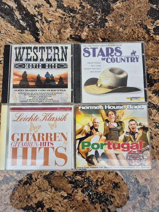 Vând 17CD muzica Country, salsa,grecesca,mixta  artisti internationali