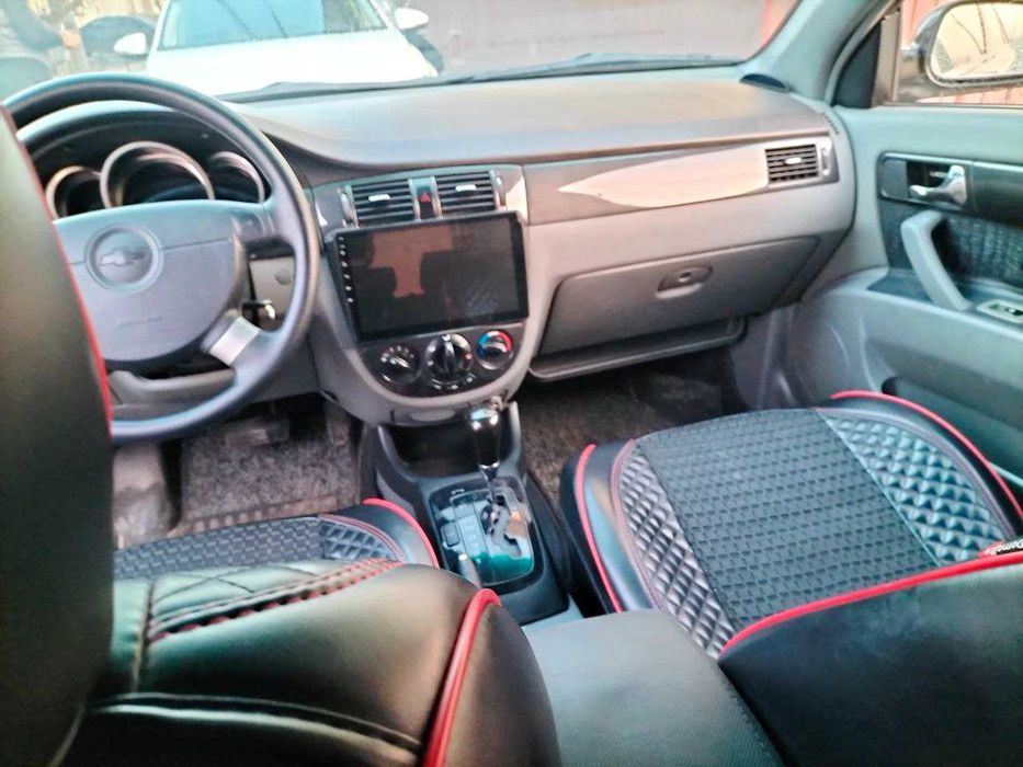 Лачетти 1,8. 3- позиция автомат  2012 год. пробег 144000.