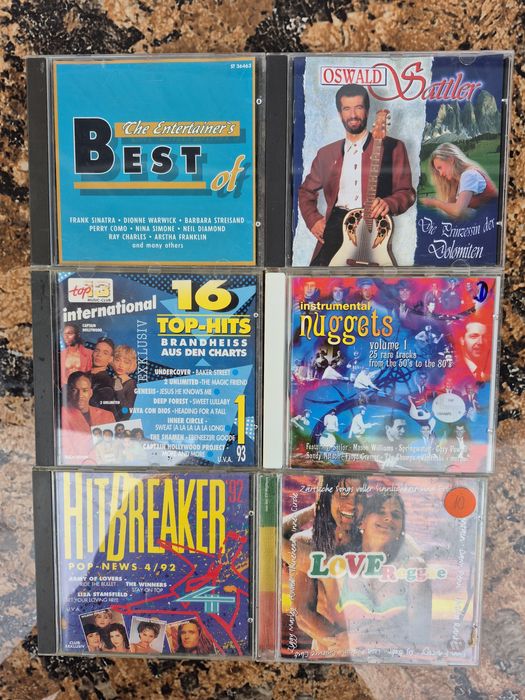 Vând 26 CD muzica usoara mixta straina artisti internationalii

- Tot