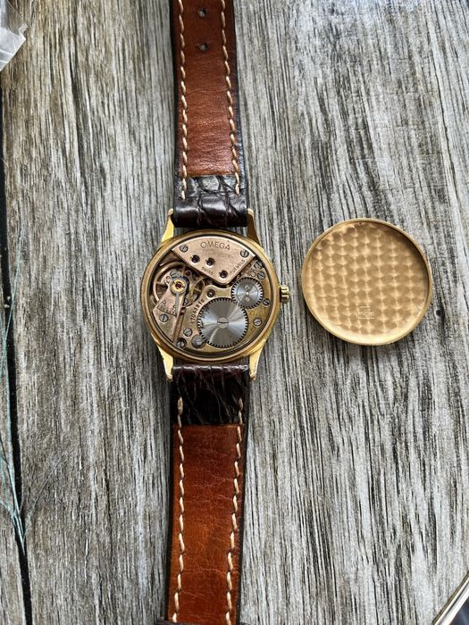 Златен часовник Omega 18k