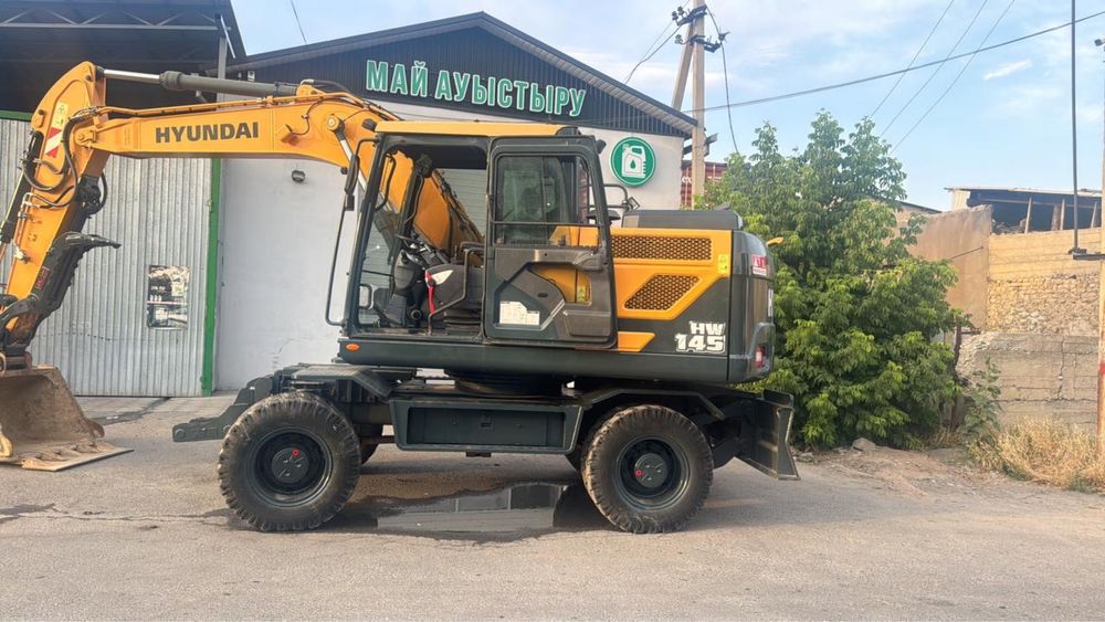 Услуги мини экскаватора. Аренда мини экскаватора