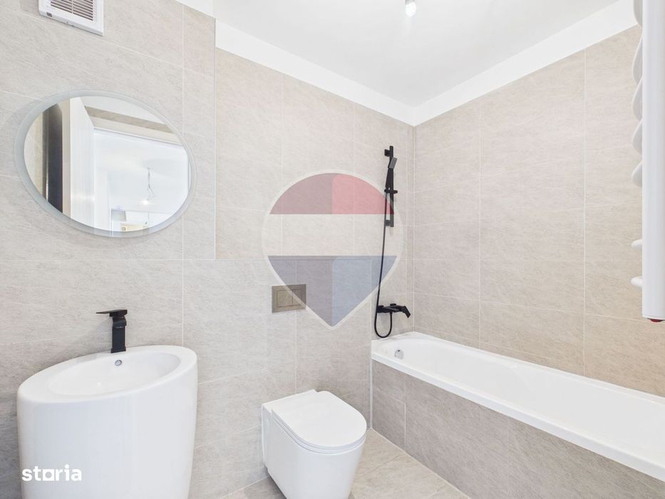 Apartament cu 3 camere de vânzare cu parcare subterana, nemobilat