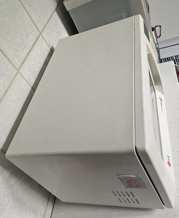 Продам микроволновку LG бу