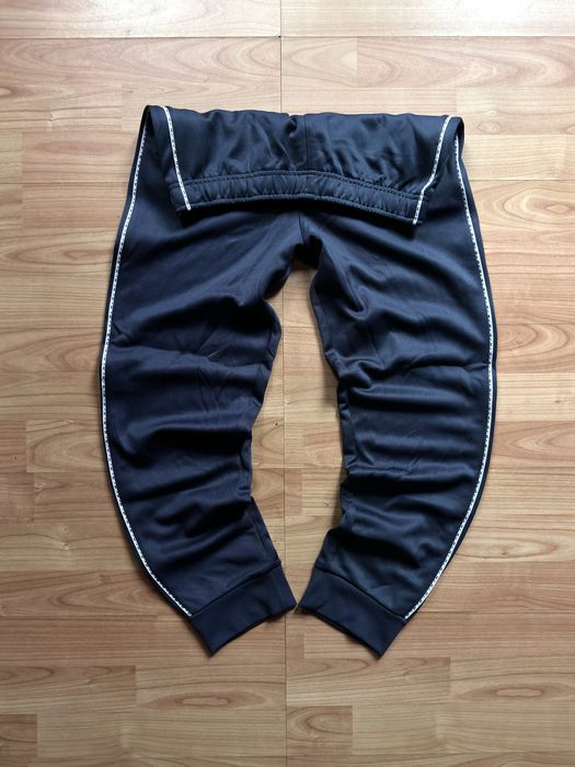 Pantaloni training pants joggers tapered leg Nike blue poliester