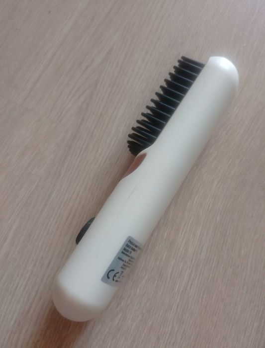 Perie pentru îndreptat părul cu efect de placă