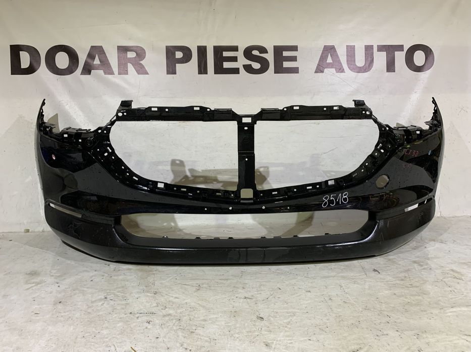 Bara fata Mazda CX30, 2019, 2020, 2021, 2022, 2023, 2024, cod origine OE DFR5-50031, cu gauri pentru senzori de parcare (4). In stare foarte buna.
