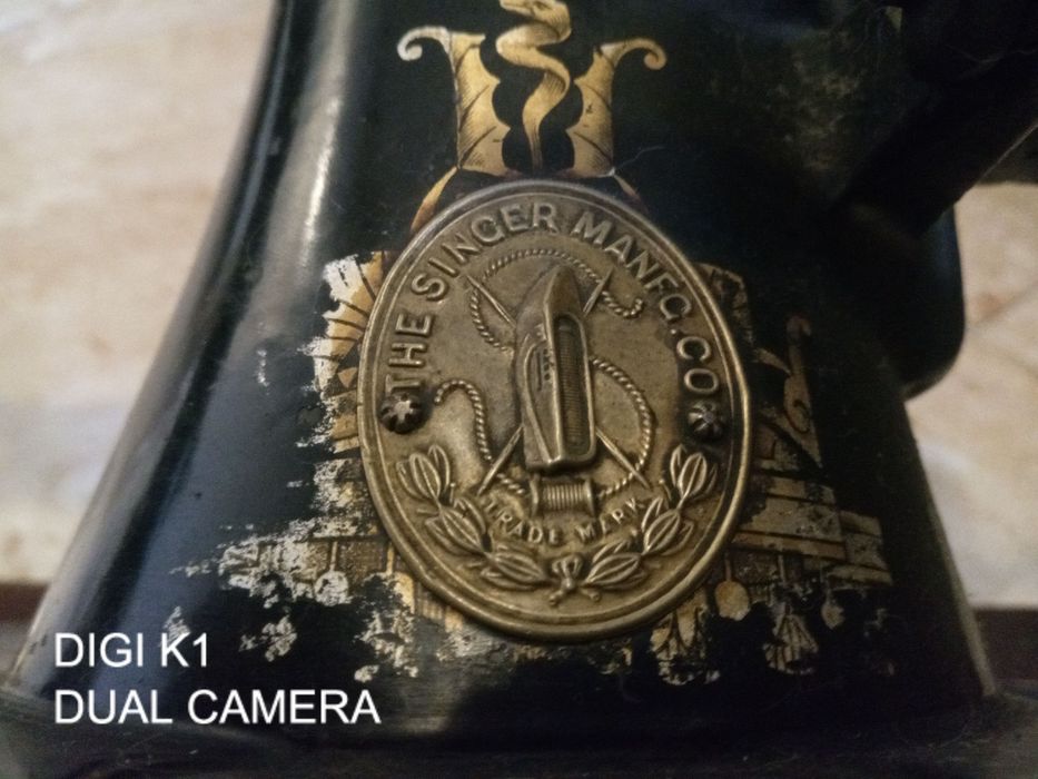 Mașină de cusut Singer