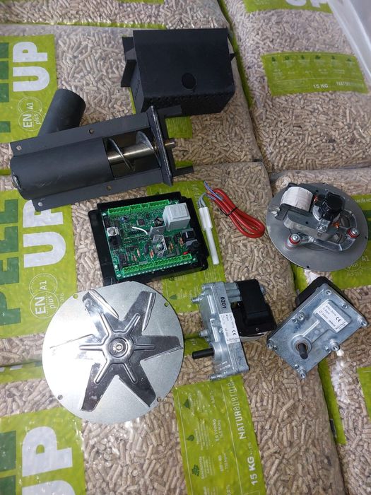 Bujii centrale cu peleti ,automatizare ,motoreductoare ,ventilatoare.