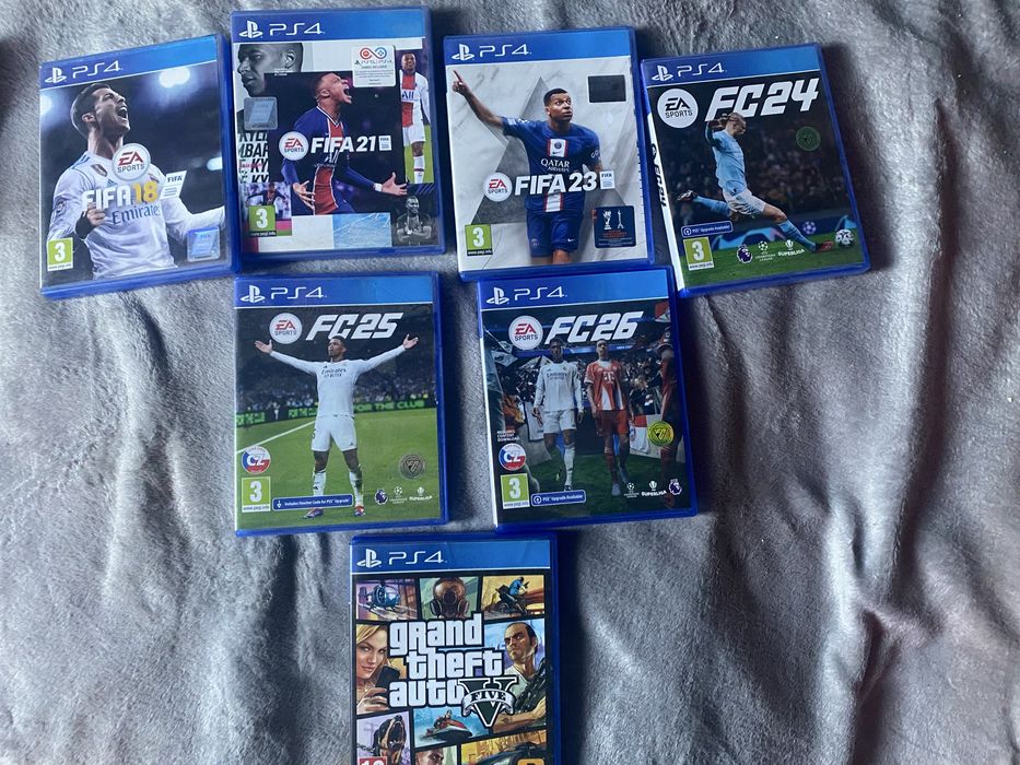 PS4 Slim 500 GB + manetă originală+ 6 jocuri