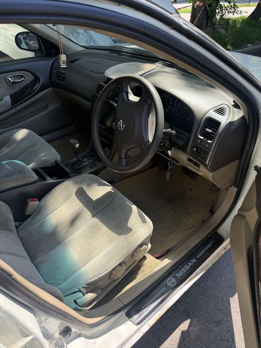 Nissan cefiro 2.0 акп белый жемчуг