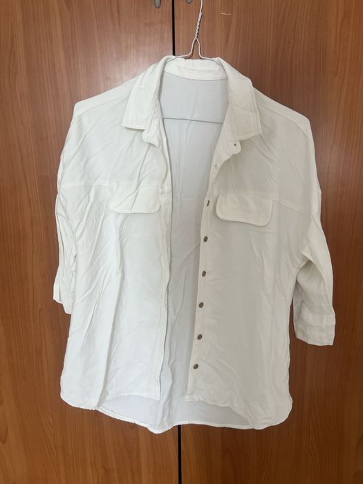 Футболки женские